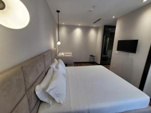 Postel nebo postele na pokoji v ubytování Delfin Resort Kune