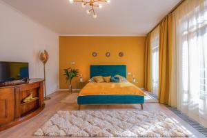Posteľ alebo postele v izbe v ubytovaní Königin Apartman