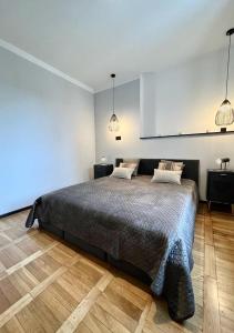 Postel nebo postele na pokoji v ubytování Flatbook - City Center Apartments Gdynia