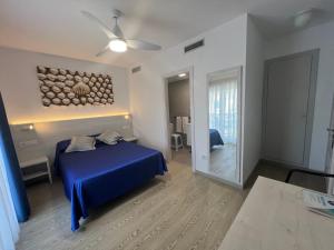 Posteľ alebo postele v izbe v ubytovaní Hotel Rio Mar