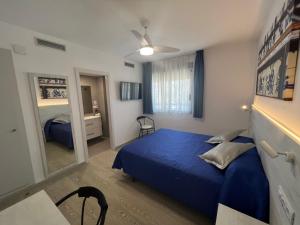 Posteľ alebo postele v izbe v ubytovaní Hotel Rio Mar