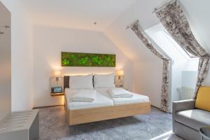 Una cama o camas en una habitación de Hotel Kongress