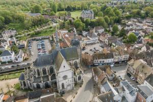 an aerial view of a small town with a church at Break & Brut in Nogent-le-Roi