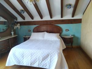 A bed or beds in a room at Camino a Casa - Suances