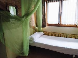 A bed or beds in a room at Camino a Casa - Suances