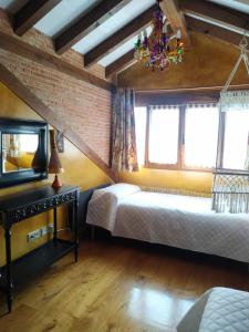 A bed or beds in a room at Camino a Casa - Suances