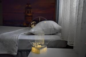 A bed or beds in a room at Elit Deniz Palamutbükü