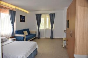 A bed or beds in a room at Elit Deniz Palamutbükü