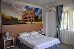 A bed or beds in a room at Elit Deniz Palamutbükü