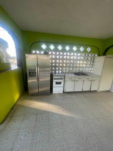 Kuchyň nebo kuchyňský kout v ubytování Combate Green House