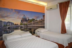 A bed or beds in a room at Elit Deniz Palamutbükü