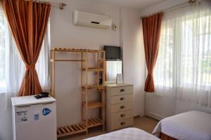 A bed or beds in a room at Elit Deniz Palamutbükü