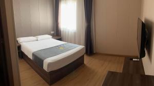 Cama o camas de una habitación en Hotel Nueva Europa