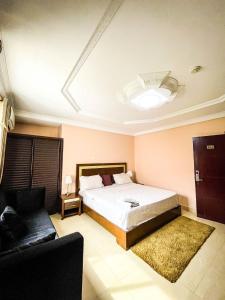 Postel nebo postele na pokoji v ubytování Cascade Hotel