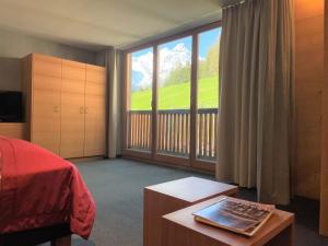 Voodi või voodid majutusasutuse Hotel Ortles B&B toas