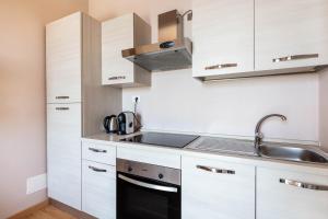 Nhà bếp/bếp nhỏ tại Gardasol Romantic 1 Vista Lago