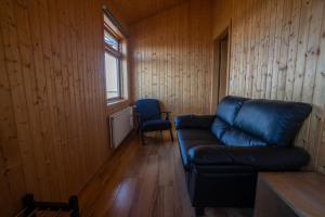 A seating area at Fossatún Sunset Cottage