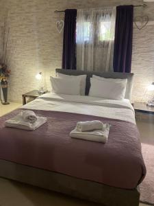 Ένα ή περισσότερα κρεβάτια σε δωμάτιο στο In The Castle - House