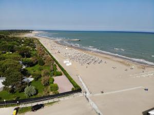 an aerial view of a beach with people on it at New Campsite in Camping Ca' Savio in Cavallino-Treporti