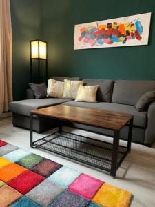 Posezení v ubytování Modernes 72qm Apartment zentral mit Küche und Boxspringbett