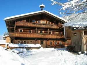 Wörglerhof's Hüttenapartments mit Kachelofen v zimě