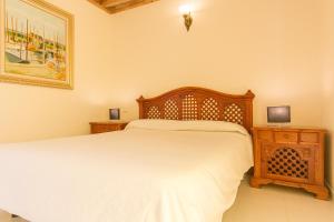 Postel nebo postele na pokoji v ubytování Sands Beach Active Resort