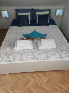 Posteľ alebo postele v izbe v ubytovaní STONE HOUSE Lovric