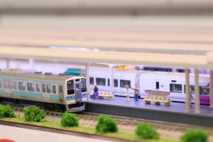 a model of a train station with a toy train at Tetsu no YA Guesthouse for Railfans in Fuefuki