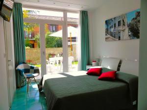 Säng eller sängar i ett rum på Villa Marina