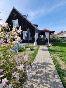 Vonkajšia záhrada v ubytovaní Domek Mazury Pisz