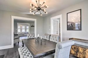 a dining room with a table and chairs at Dog-Friendly Home about 14 Mi to Highmark Stadium in Cheektowaga