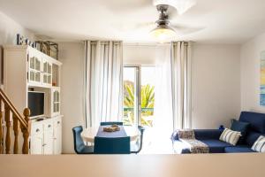A seating area at LIVE TAJAO BEACH