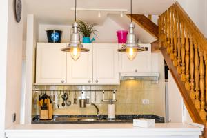 A kitchen or kitchenette at LIVE TAJAO BEACH