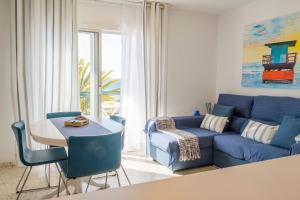 A seating area at LIVE TAJAO BEACH