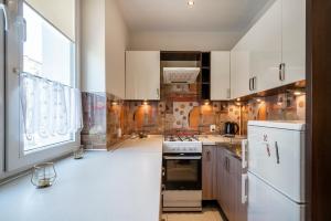 Kuchyňa alebo kuchynka v ubytovaní 05 Gdynia Centrum - Apartament Mieszkanie dla 4 os + 1 fotografia