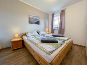 Postel nebo postele na pokoji v ubytování Holiday Home Friesenperle by Interhome