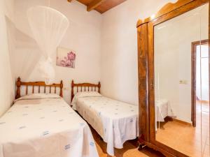 Postel nebo postele na pokoji v ubytování Holiday Home Can Felip by Interhome