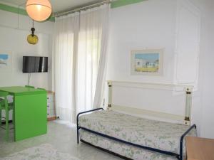 A bed or beds in a room at Apartment Bellavista-7 by Interhome