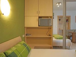 Posteľ alebo postele v izbe v ubytovaní Studio Frischmann-2 by Interhome