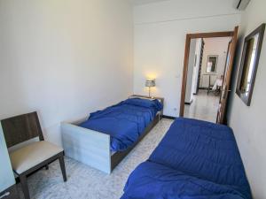 Posteľ alebo postele v izbe v ubytovaní Apartment Orizzonte by Interhome
