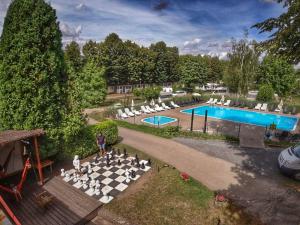 Bazén v ubytovaní Holiday Home Sunset Terrace by Interhome alebo v jeho blízkosti