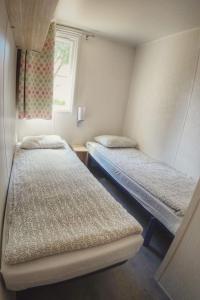 Posteľ alebo postele v izbe v ubytovaní Holiday Home Sunset Terrace by Interhome