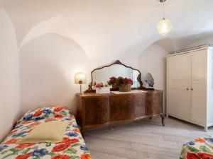 A bed or beds in a room at Holiday Home Francesca - SLR212 by Interhome