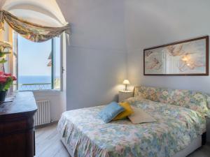 A bed or beds in a room at Holiday Home Francesca - SLR212 by Interhome