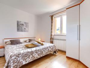 Posteľ alebo postele v izbe v ubytovaní Holiday Home House Eric&Paolo by Interhome