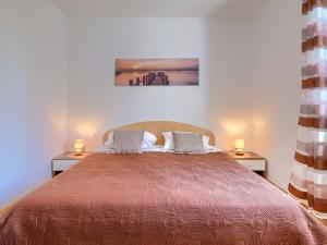 Posteľ alebo postele v izbe v ubytovaní Holiday Home House Eric&Paolo by Interhome
