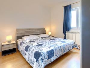 Posteľ alebo postele v izbe v ubytovaní Holiday Home House Eric&Paolo by Interhome