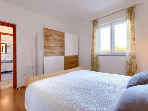 Posteľ alebo postele v izbe v ubytovaní Holiday Home House Eric&Paolo by Interhome