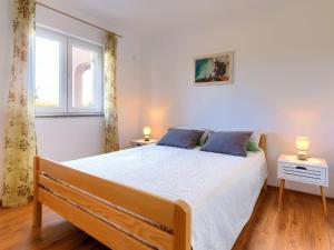 Posteľ alebo postele v izbe v ubytovaní Holiday Home House Eric&Paolo by Interhome