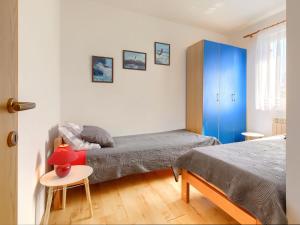 Posteľ alebo postele v izbe v ubytovaní Holiday Home House Eric&Paolo by Interhome